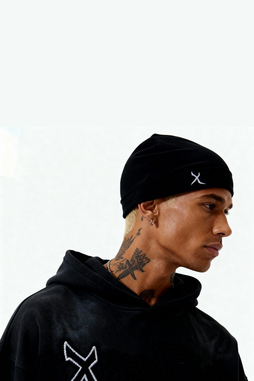 EXCENTRED SKULL CAP