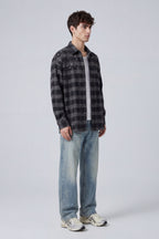 BLACK SPLATTER PLAID FLANNEL