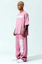DISTRESSED T-SHIRT SET SAKURA PINK – Set aus T-Shirt und Jogger von EXCENTRED – Produktbild 2