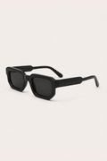 BLACKOUT BLOCK SUNGLASSES – all-black block frame sunglasses with dark lenses, side view