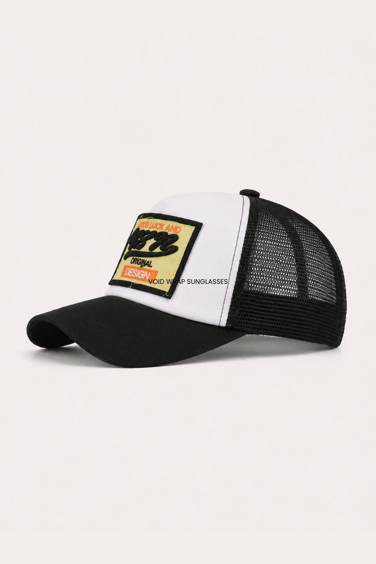 ORIGINAL DESIGN TRUCKER CAP – black and white trucker cap with mesh back and stitched front patch, side view