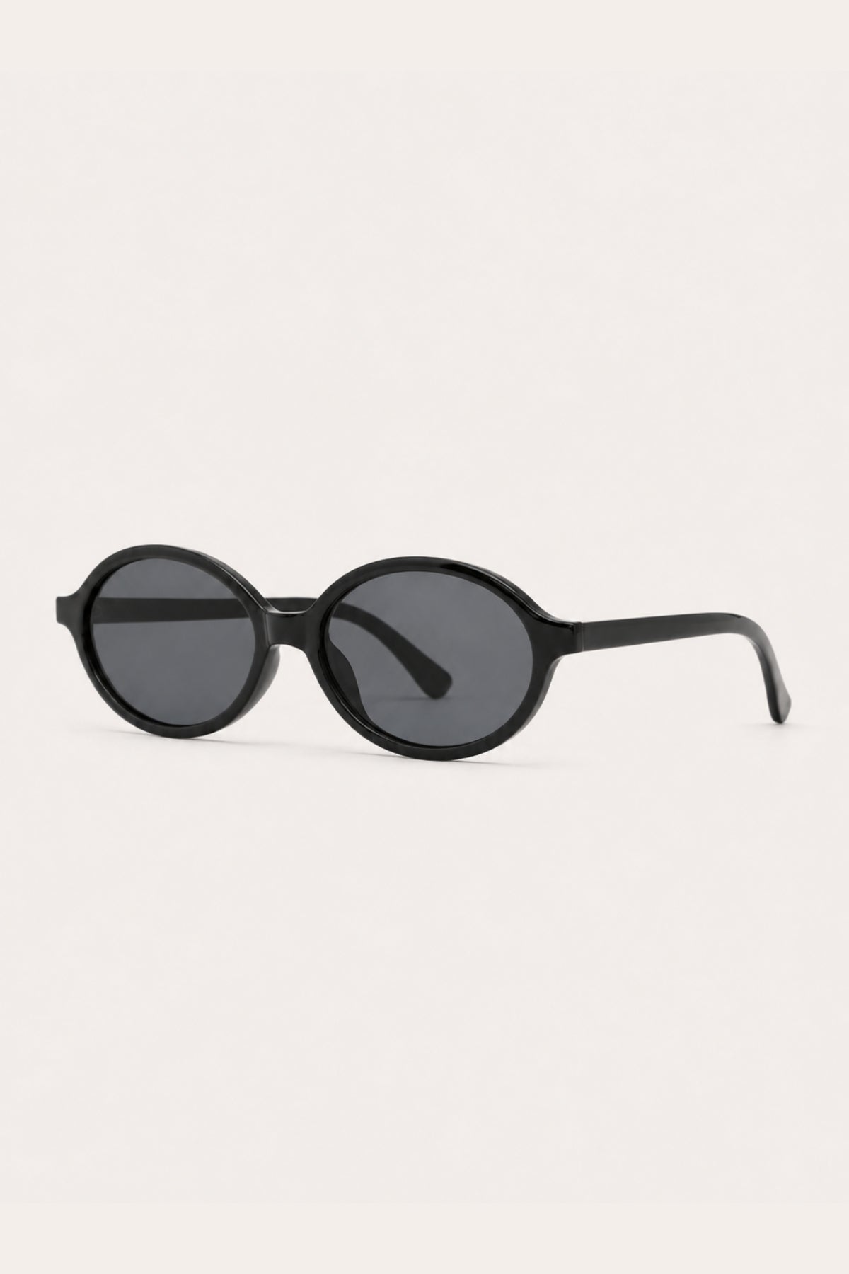 SMOKE OVAL SUNGLASSES – black oval sunglasses with smoke grey lenses, side view